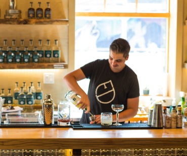 Staff pouring spirits at Fernie Distillers