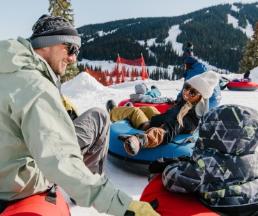 Family enjoying the tube park at Sun Peaks