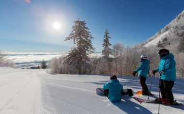 Skiers and Snowboarder overlooking at Furano ski fields