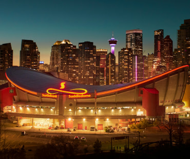 The Calgary saddledome lighting up at night