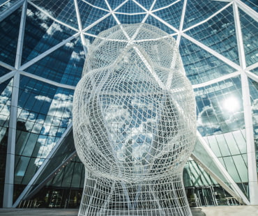 Giant sculpture of head made from mesh steel in Calgary