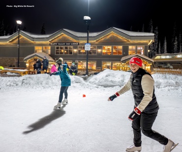 People smiling having fun on the ice skating rink