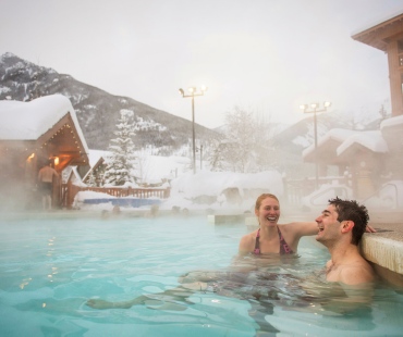 people enjoying the hotspring pools