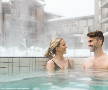 People enjoying the hot tubs at Revelstoke 