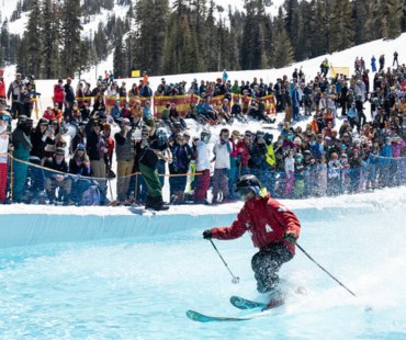 Skier gliding across water at slush cup event