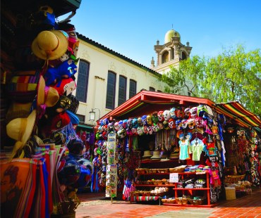 Stalls packed with colorful souvenirs in olvera street