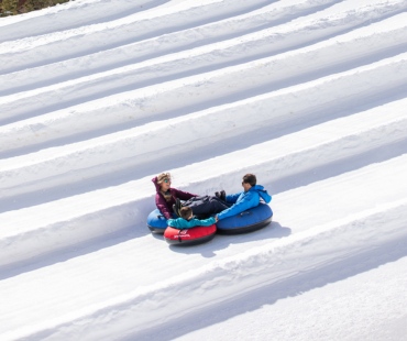 family going tube lane at Mammoth