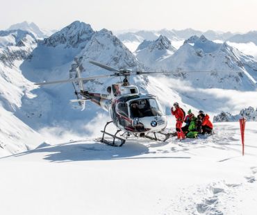 Helicopter and skiers landed in backcountry