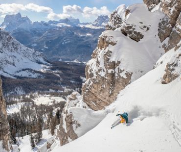 Skier in deep backcountry snow