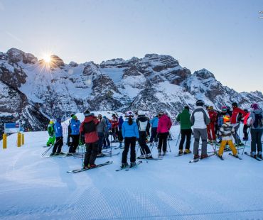 people gathering for sunrise skiing