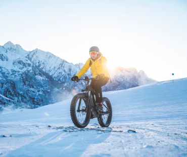 Person riding Fat Bike on the snowy trails