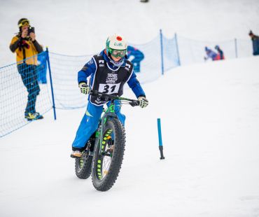 Kid competing in Fat Biking competition