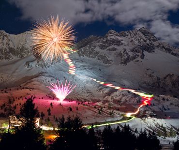 Beautiful torchlit ski hills and fireworks