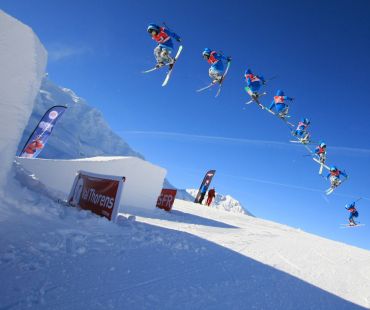 Skier performing tricks at Val Thorens Snow park