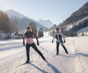 People enjoying the nature while cross country skiing on nordic trails