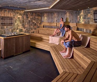 People enjoying the warm saunas