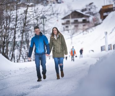 Couple hiking in the beautiful mountain trails