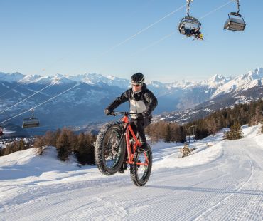 Person riding Fat Bike on snowy trails