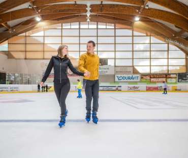 Couple Ice Skating in Val Gardena