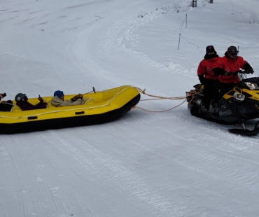 Rafts pulled by snowmobile Rafts pulled by snowmobile
